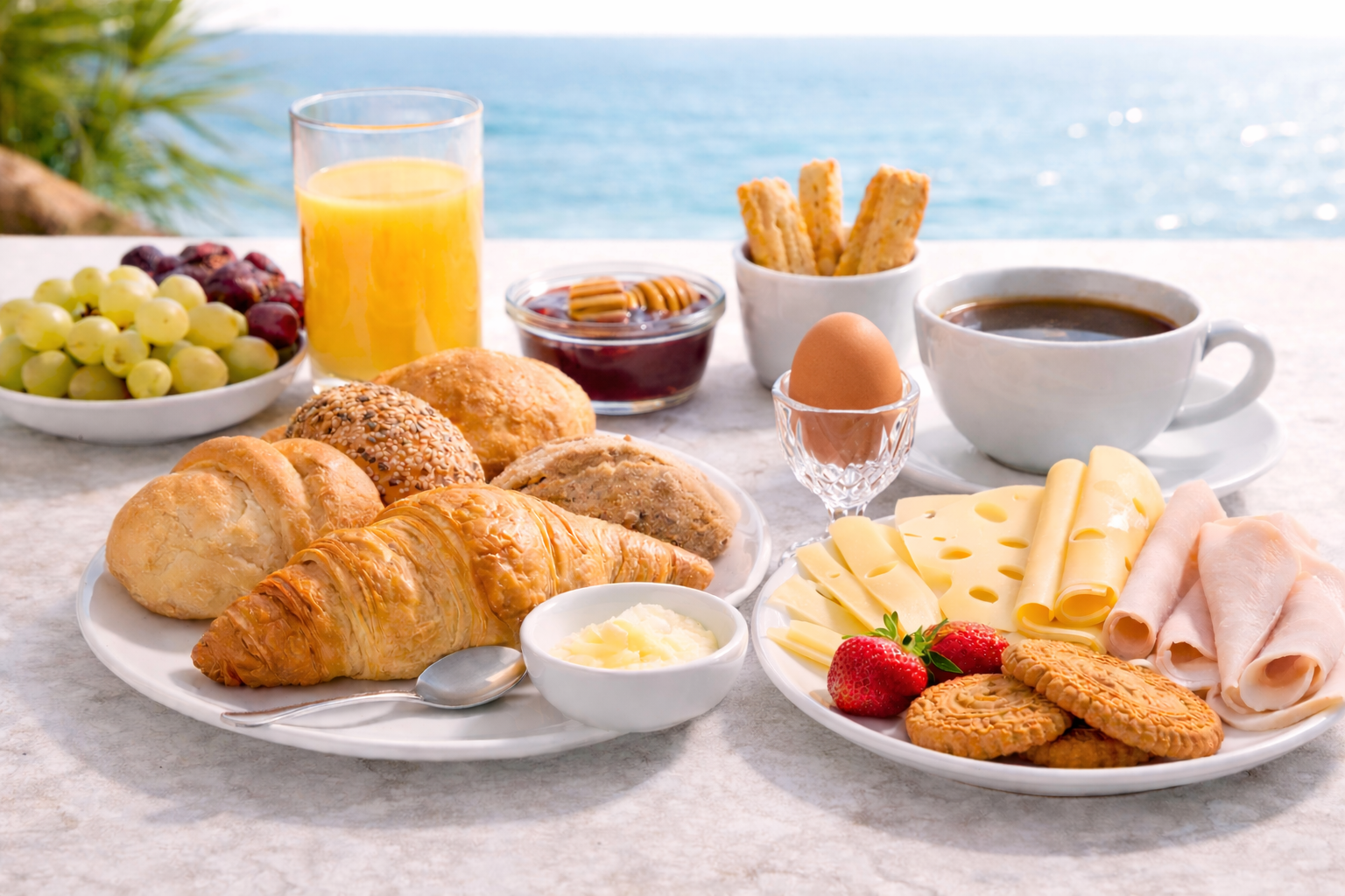 Morning breakfast with croissants, coffee and Aegean sea view